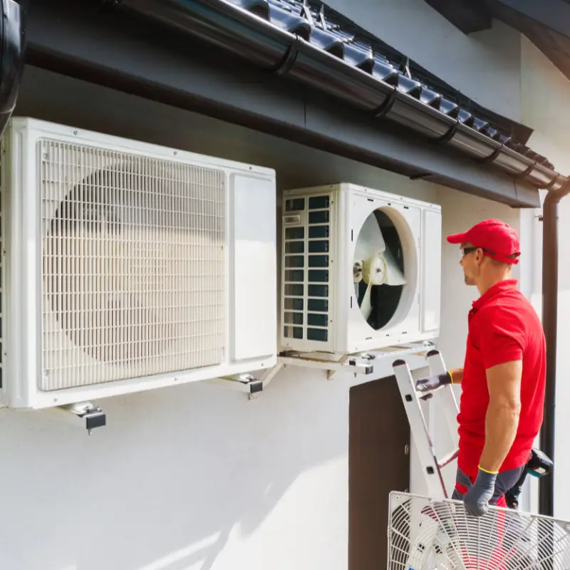 Takyeef Care technician repairing outdoor split air conditioner unit on wall , about us